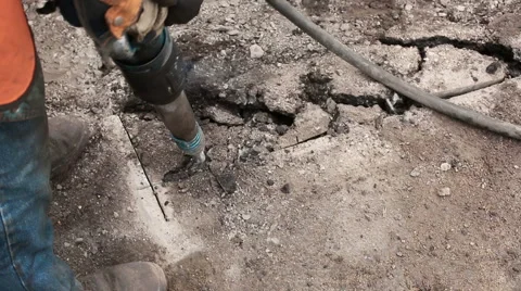 Road Worker Using Jackhammer Stock Footage 61560614