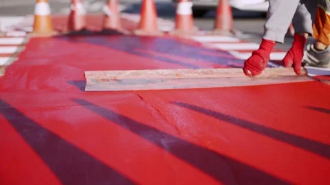 Road Workers Applying Red Thermoplastic Asphalt Marking Stock-Footage 331826782