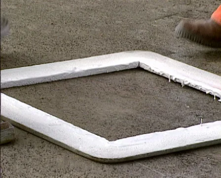 Road workers applying road marking to the road using a template - close up Stock Footage 39782457