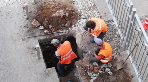 Road workers close up the pithole, top view Stock Footage 60664381