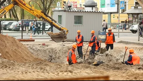 Road workers making some common excavation Stock Footage 5090924