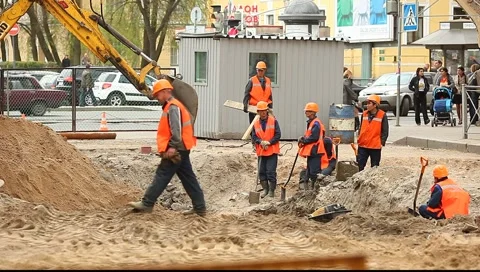 Road workers making some common excavation Stock Footage 5090979