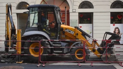 Road workers working on the road Stock Footage 70469499