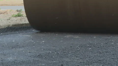 Road works. Road roller. Compaction of asphalt. Stock Footage 40524196