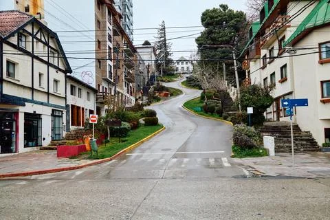 Road zigzagging up between buildings Stock Photos