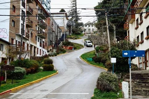 Road zigzagging up between buildings Stock Photos