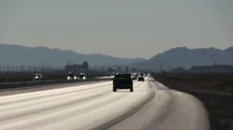 ROAD2LA-0021 HIGHWAY TRAFFIC ON DESERT HIGHWAY Stock Footage 10713147
