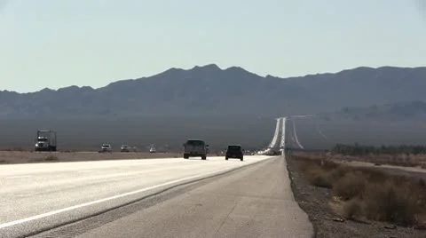 ROAD2LA-0031 SPEEDING TIMELAPSE DESERT HIGHWAY Stock Footage 10713219