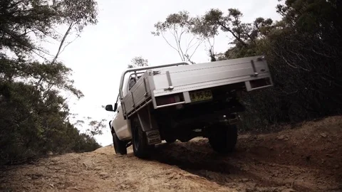 Off roading in a 4WD up a hill in a forest Video stock 81603193