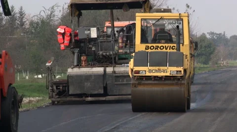 Roading Machinery - Rollers Compress Asphalt Stock Footage 46941092