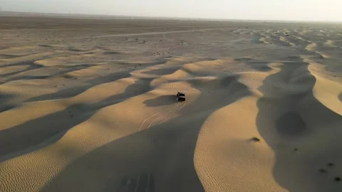 Off-roading Over the Desert Dunes Stock Footage 156961553