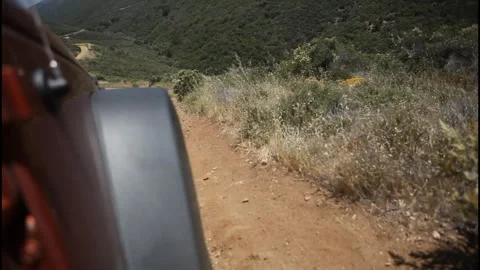 Off roading pov of bumpy trail ahead going downhill Stock Footage 302244500