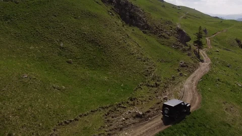 Off-Roading Through Pristine Mountain Paths Stock Footage 254432504