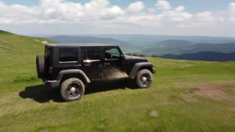 Off-Roading Through Pristine Mountain Paths Stock Footage 254432544