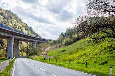 Roads among green fields Stock Photos
