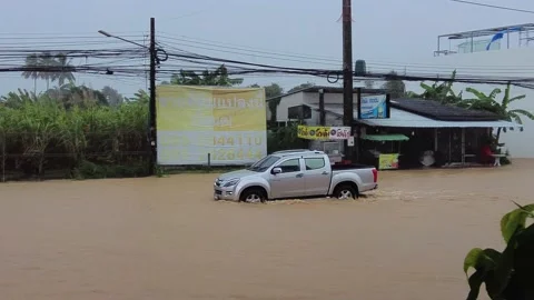 Roads flooded after flooding due to heavy rains in Phuket Stock Footage 219780988