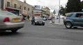 Roads intersection in the center of Paphos city with cars traffic, Cyrpus HD Footage