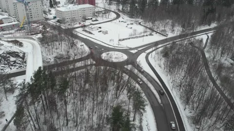 Roads Leading up to Roundabout, Winter Traffic Scene, Aerial Vídeos de archivo 149693136
