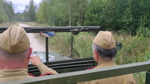 On the roads of war in a jeep through the forest 1 Stock Footage 156804664