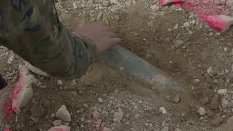 Roadside bomb - IED Improvised Explosive device discovery Stock Footage