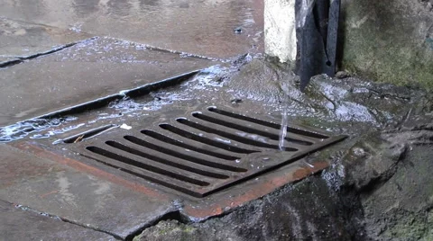 Roadside Drain with rain water Stock Footage 57140694