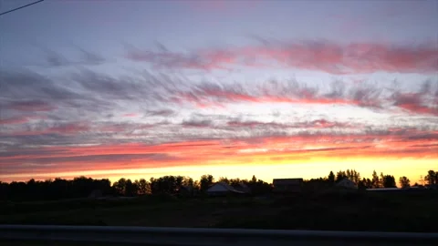 Roadside under the sunset sky view from the car Video stock 133738702