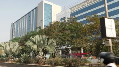 Roadside view of a building, View of glass building Stock-Footage 147685813