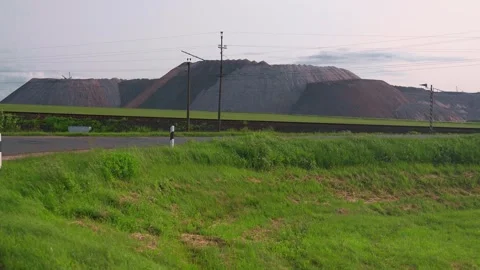 Roadside view of potash waste heaps from a mining operation Stock Footage 322665333