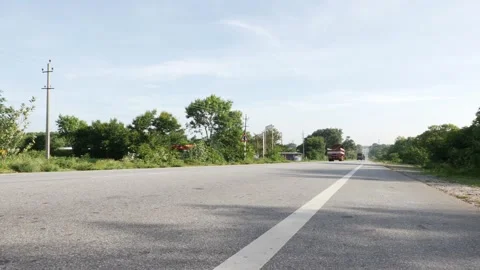 Roadside view of truck passing through road Vídeo Stock 156973825