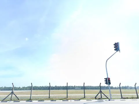 A roadside view under a bright blue sky Stock Photos