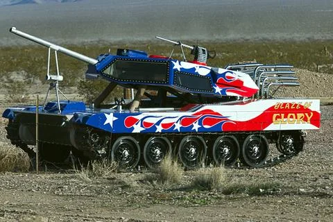 Roadside Warrior: Modified Tank Structure Paused Near Highway Stock Photos