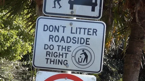Roadsign against plastic polution and litter: Don't Litter Roadside (50 FPS) Video stock 104151323