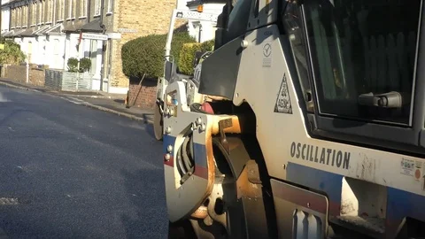 Roadwork Construction Man Working to Laying New Tarmac Paving Stock Footage 70239306