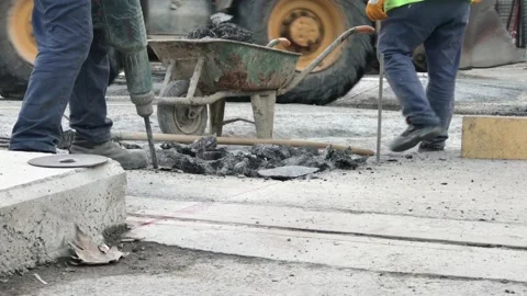 Roadwork excavation on asphalt Stock Footage 146045704