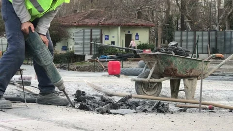 Roadwork excavation on asphalt Stock Footage 146045930