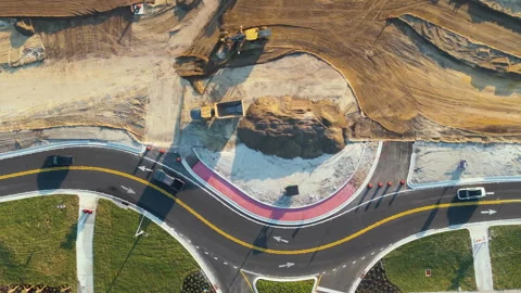 Roadworks construction site at roundabout intersection on American highway Stock Footage 272894123