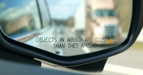 ROANE CO, TN - 13 MAR 2024: Rearview mirror of moving vehicle Vidéo 280363116