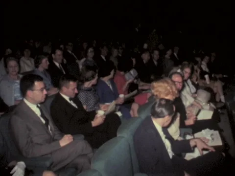 Roanoke, VA - 5/11/67: Well-dressed audience in theater Stock Footage 233631341