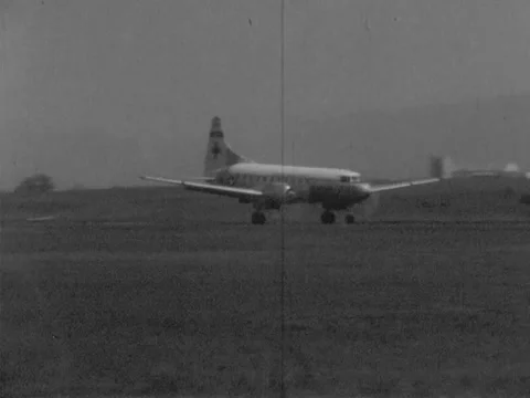 Roanoke, VA - 9/20/59: Air Force medical plane lands at Woodrum Airport Stock Footage 234445161