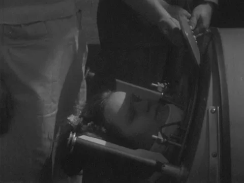 Roanoke, VA - 9/20/59: Couple greets daughter in iron lung Stock Footage 234445181