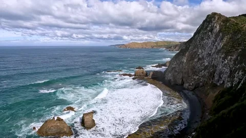 Roaring Bay at Nugget Point  Dramatic Cliffs and Coastal Scenery on the Sou.. Stock Footage 284778413
