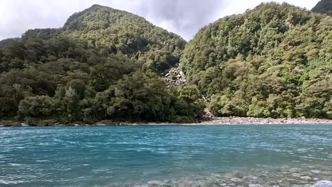 Roaring Billy Falls : Turquoise water and waterfalls of Haast River in Moun.. Stock Footage 288043455