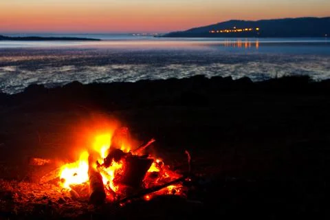 Roaring bonfire at the beach Stock Photos