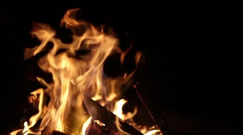 Roaring Campfire at Night - Slow Tilt 50fps Stock Footage 49814744