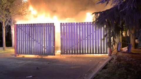 Roaring Dumpster Fire In A Fenced Area L Stock Video Pond5