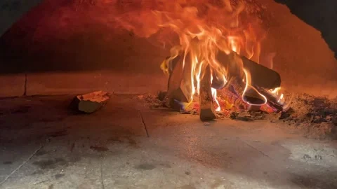 Roaring flames inside a pizza oven Stock Footage 235987079