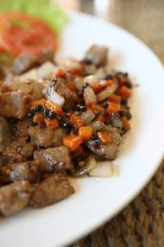 Roast beef with black pepper Stock Photos