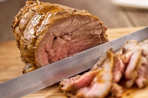 Roast Beef on a Cutting Board. High quality photo Stock Photos