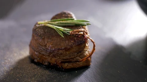 Roast beef filet mignon.  Cutting Twine. Stock Footage 106924056