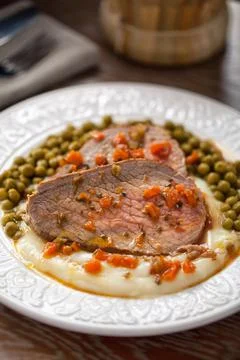 Roast Beef With Mashed Potatoes and Peas Stock Photos